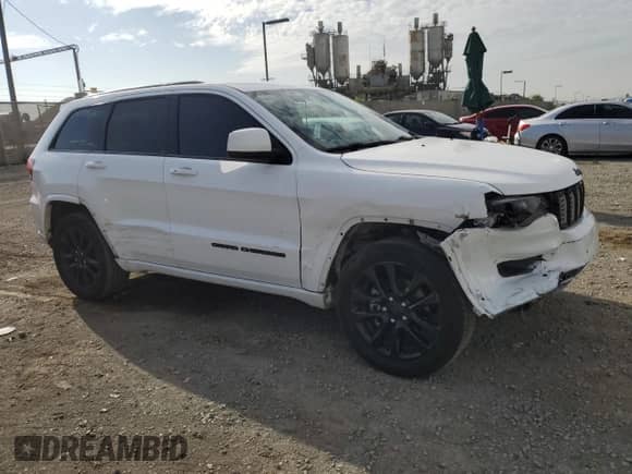 2018 Jeep Grand Cherokee Laredo E с VIN 1C4RJEAGXJC306457, выставлен на аукционе Copart как лот 81731105 с пробегом 77 468 миль миль и Списание • Salvage title. История ставок и продаж доступна на DreamBid. Изображение 4.