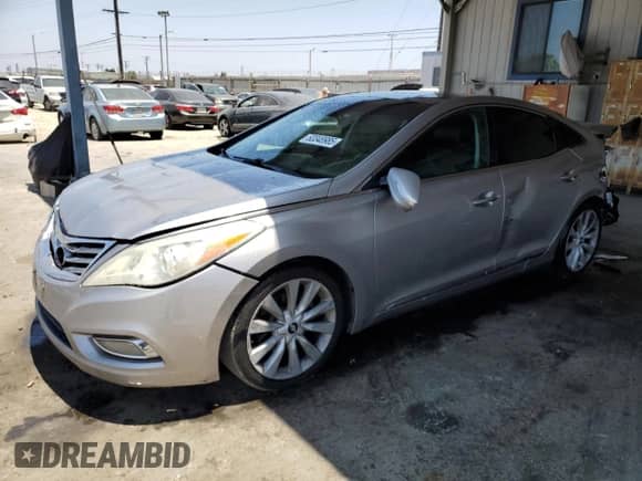 2012 Hyundai Azera с VIN KMHFH4JG8CA191831, выставлен на аукционе Copart как лот 63348985 с пробегом 189 389 миль миль и Списание • Salvage title. История ставок и продаж доступна на DreamBid. Изображение 1.