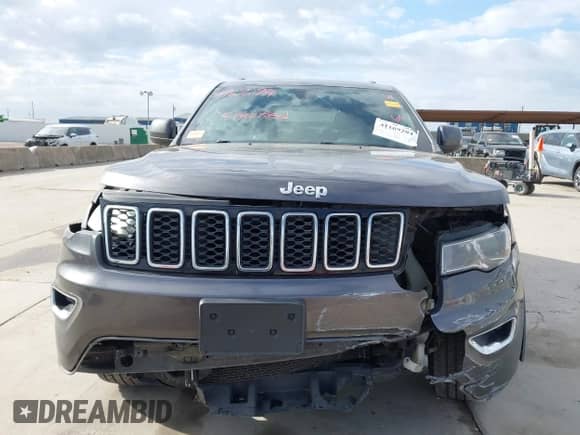 2018 Jeep Grand Cherokee Laredo z VIN 1C4RJEAG7JC450922, wystawiony jako IAAI lot #41169294 z przebiegiem 158 689 mil mil oraz . Historia ofert i sprzedaży dostępna na DreamBid. Obrazek 6.