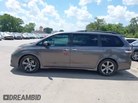 2014 Toyota Sienna SE with VIN 5TDXK3DC8ES443113, listed as a IAAI auction lot 42735795 with 235,269 mi miles and . Bid and sale history available at DreamBid. Image 15.