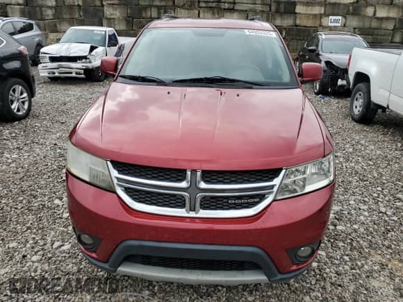 2011 Dodge Journey SXT z VIN 3D4PG5FG3BT564357, wystawiony jako Copart lot #64993325 z przebiegiem 189 653 mil mil oraz Szkoda całkowita • Salvage title. Historia ofert i sprzedaży dostępna na DreamBid. Obrazek 5.