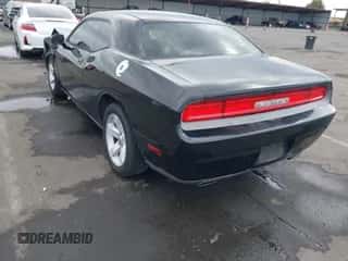 2013 Dodge Challenger SXT with VIN 2C3CDYAG8DH607460, listed as a IAAI auction lot 43295577 with 139,822 mi miles and . Bid and sale history available at DreamBid. Image 3.