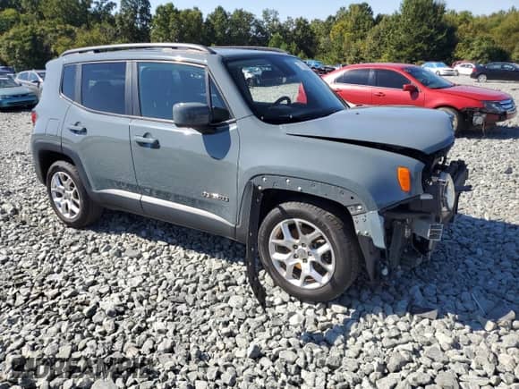 2018 Jeep Renegade Latitude with VIN ZACCJABB9JPJ07071, listed as a Copart auction lot 71979965 with 142,641 mi miles and Salvage title. Bid and sale history available at DreamBid. Image 4.