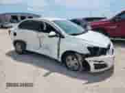 2014 Chevrolet Sonic LT with VIN 1G1JC5SH4E4124695, listed as a Copart auction lot 68474395 with Not provided miles and Salvage title. Bid and sale history available at DreamBid. Image 4.