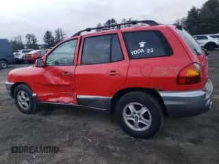 2003 Hyundai Santa Fe GLS z VIN KM8SC13E63U474203, wystawiony jako Copart lot #87292474 z przebiegiem 219 660 mil mil oraz Szkoda całkowita • Salvage title. Historia ofert i sprzedaży dostępna na DreamBid. Obrazek 2.