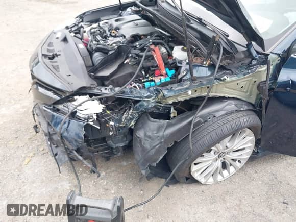 2020 Toyota Camry Hybrid XLE z VIN 4T1F31AK7LU521801, wystawiony jako IAAI lot #42707425 z przebiegiem 66 573 mil mil oraz . Historia ofert i sprzedaży dostępna na DreamBid. Obrazek 6.