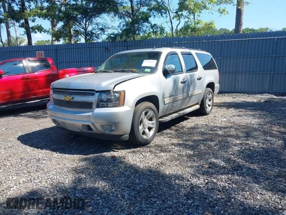 2013 Chevrolet Suburban LT with VIN 1GNSKJE7XDR103661, listed as a IAAI auction lot 42789275 with 181,234 mi miles and . Bid and sale history available at DreamBid. Image 2.