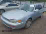 1996 Toyota Camry DX with VIN 4T1BG12K4TU734920, listed as a IAAI auction lot 42756192 with 208,815 mi miles and . Bid and sale history available at DreamBid. Image 2.