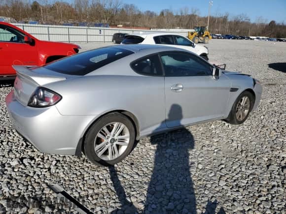 2008 Hyundai Tiburon GS с VIN KMHHM66D18U280905, выставлен на аукционе Copart как лот 80122744 с пробегом 116 473 миль миль и Списание • Salvage title. История ставок и продаж доступна на DreamBid. Изображение 3.