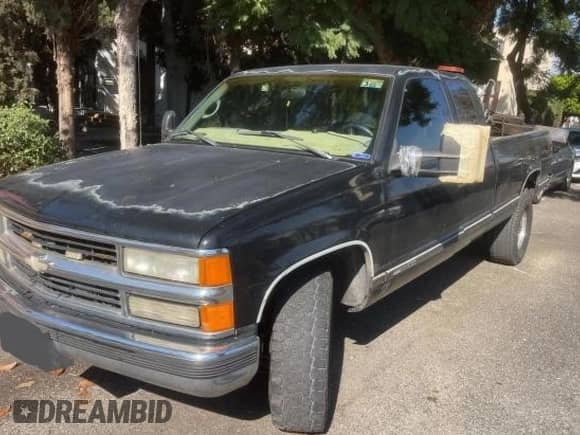 1997 Chevrolet Silverado 2500 с VIN 1GCGC29J3VE172028, выставлен на аукционе Copart как лот 79263434 с пробегом 187 881 миль миль и Списание • Salvage title. История ставок и продаж доступна на DreamBid. Изображение 2.