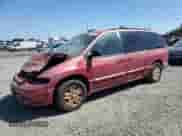 1996 Dodge Caravan LE with VIN 1B4GP54L6TB474164, listed as a Copart auction lot 68705005 with 375,295 mi miles and Salvage title. Bid and sale history available at DreamBid. Image 1.