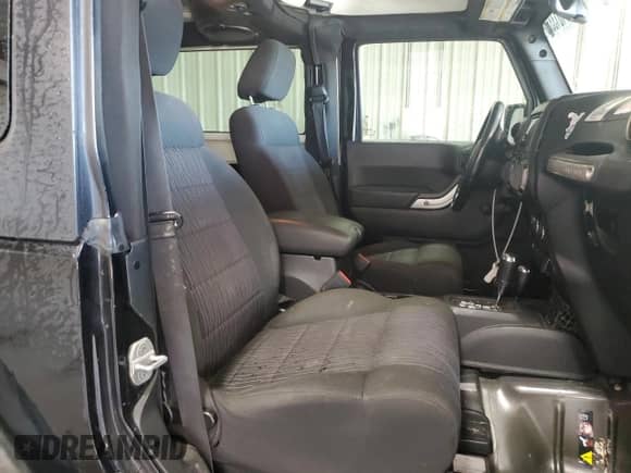 2012 Jeep Wrangler Sport with VIN 1C4AJWAG4CL215593, listed as a Copart auction lot 71013325 with 112,333 mi miles and Salvage title. Bid and sale history available at DreamBid. Image 11.