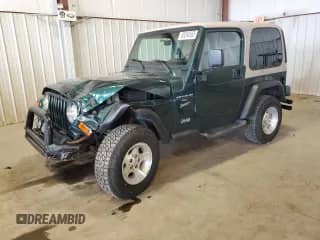 1999 Jeep Wrangler Sport с VIN 1J4FY19S6XP489688, выставлен на аукционе Copart как лот 80084565 с пробегом 198 175 миль миль и Списание • Salvage title. История ставок и продаж доступна на DreamBid. Изображение 1.