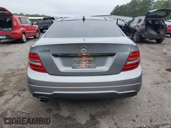2014 Mercedes-Benz C 250 with VIN WDDGJ4HB9EG195786, listed as a Copart auction lot 57779475 with Not provided miles and Salvage title. Bid and sale history available at DreamBid. Image 6.