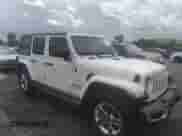 2021 Jeep Wrangler Unlimited Sahara Altitude z VIN 1C4HJXEN8MW536100, wystawiony jako IAAI lot #37184105 z przebiegiem 62 965 mil mil oraz . Historia ofert i sprzedaży dostępna na DreamBid. Obrazek 1.