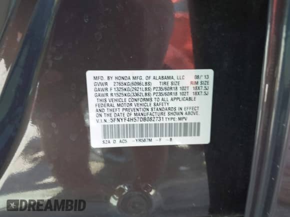 2013 Honda Pilot EX-L with VIN 5FNYF4H57DB082731, listed as a IAAI auction lot 43203205 with 96,017 mi miles and . Bid and sale history available at DreamBid. Image 9.