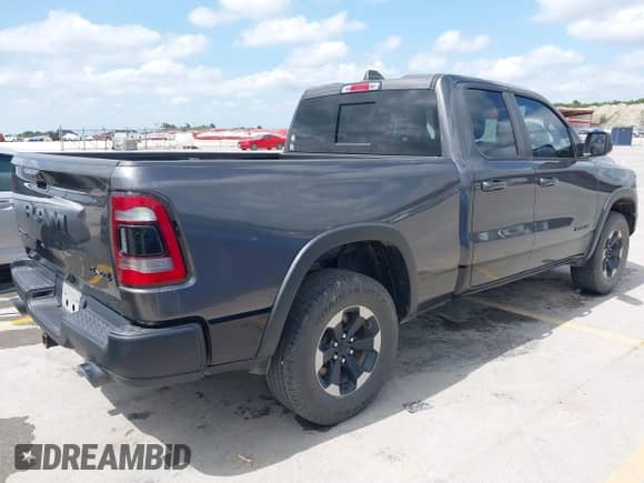 2020 Ram 1500 Rebel with VIN 1C6SRFET5LN281571, listed as a IAAI auction lot 42366496 with 91,823 mi miles and . Bid and sale history available at DreamBid. Image 4.