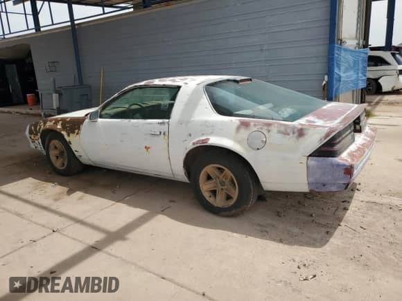 1986 Chevrolet Camaro Z28 Sport с VIN 1G1FP87H5GL170663, выставлен на аукционе Copart как лот 56786805 с пробегом 21 321 миль миль и Чистый • Clean title. История ставок и продаж доступна на DreamBid. Изображение 2.