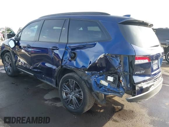 2022 Honda Pilot Sport z VIN 5FNYF5H34NB029023, wystawiony jako IAAI lot #41602649 z przebiegiem 64 997 mil mil oraz . Historia ofert i sprzedaży dostępna na DreamBid. Obrazek 3.