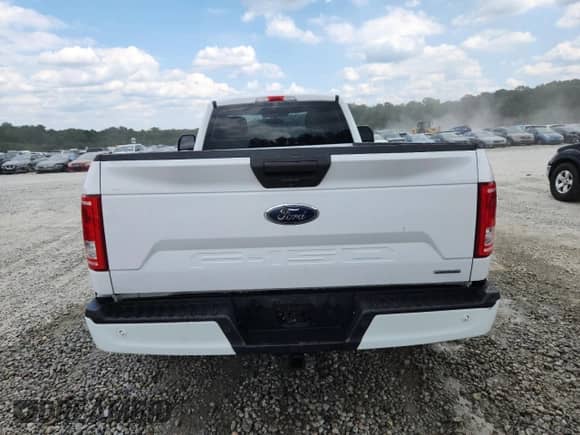 2017 Ford F-150 XL с VIN 1FTMF1C86HKD06918, выставлен на аукционе Copart как лот 71556305 с пробегом 203 452 миль миль и Списание • Salvage title. История ставок и продаж доступна на DreamBid. Изображение 6.