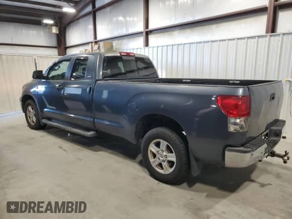 2007 Toyota Tundra SR5 with VIN 5TFST54107X001148, listed as a Copart auction lot 87414295 with 164,327 mi miles and Clean title. Bid and sale history available at DreamBid. Image 2.