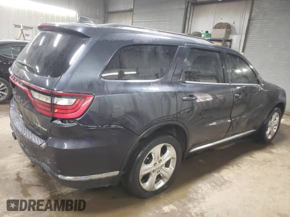2014 Dodge Durango Limited with VIN 1C4SDJDTXEC332900, listed as a Copart auction lot 75940244 with 221,196 mi miles and Salvage title. Bid and sale history available at DreamBid. Image 3.