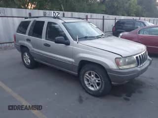 2003 Jeep Grand Cherokee Laredo z VIN 1J4GX48S63C506971, wystawiony jako IAAI lot #43217099 z przebiegiem 163 485 mil mil oraz . Historia ofert i sprzedaży dostępna na DreamBid. Obrazek 1.