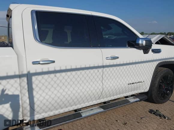 2023 GMC Sierra 1500 Denali z VIN 3GTUUGED4PG345211, wystawiony jako IAAI lot #42995625 z przebiegiem 63 396 mil mil oraz . Historia ofert i sprzedaży dostępna na DreamBid. Obrazek 13.