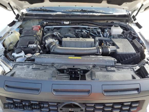 2025 Nissan Frontier Pro-4X with VIN 1N6ED1EK2SN628803, listed as a Copart auction lot 65702835 with 1,574 mi miles and Salvage title. Bid and sale history available at DreamBid. Image 11.