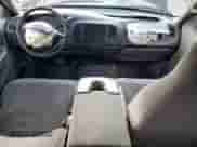 1999 Ford F-150 z VIN 2FTRX18W3XCA86263, wystawiony jako Copart lot #81858165 z przebiegiem 230 813 mil mil oraz Szkoda całkowita • Salvage title. Historia ofert i sprzedaży dostępna na DreamBid. Obrazek 8.