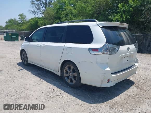 2012 Toyota Sienna SE with VIN 5TDXK3DC1CS186020, listed as a IAAI auction lot 42471455 with 215,048 mi miles and . Bid and sale history available at DreamBid. Image 3.