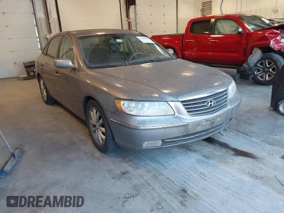 2006 Hyundai Azera SE z VIN KMHFC46F46A106177, wystawiony jako IAAI lot #41643689 z przebiegiem 159 182 mil mil oraz . Historia ofert i sprzedaży dostępna na DreamBid. Obrazek 1.