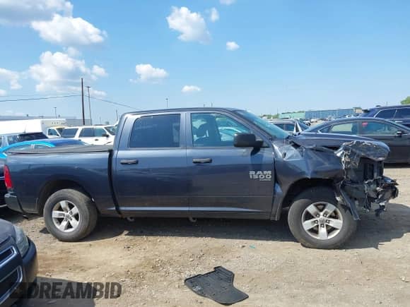 2019 Ram 1500 Tradesman with VIN 1C6RR7KG3KS504265, listed as a IAAI auction lot 43184724 with 97,887 mi miles and . Bid and sale history available at DreamBid. Image 13.