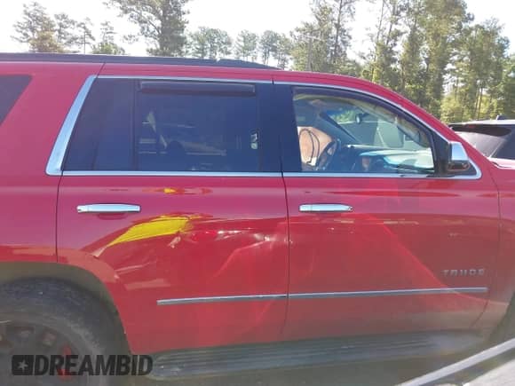 2019 Chevrolet Tahoe LS with VIN 1GNSKAKC1KR197010, listed as a IAAI auction lot 42718151 with 117,781 mi miles and . Bid and sale history available at DreamBid. Image 13.