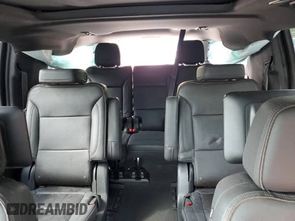 2023 Chevrolet Suburban High Country with VIN 1GNSKGKL4PR318428, listed as a Copart auction lot 65628925 with 37,751 mi miles and Salvage title. Bid and sale history available at DreamBid. Image 10.