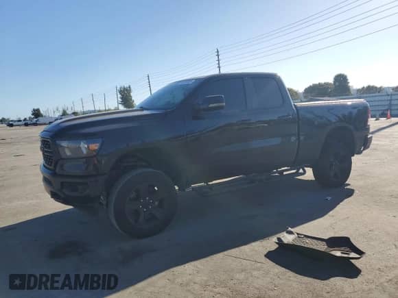 2023 Ram 1500 Lone Star z VIN 1C6RREBTXPN553048, wystawiony jako Copart lot #46255525 z przebiegiem 59 497 mil mil oraz Szkoda całkowita • Salvage title. Historia ofert i sprzedaży dostępna na DreamBid. Obrazek 1.