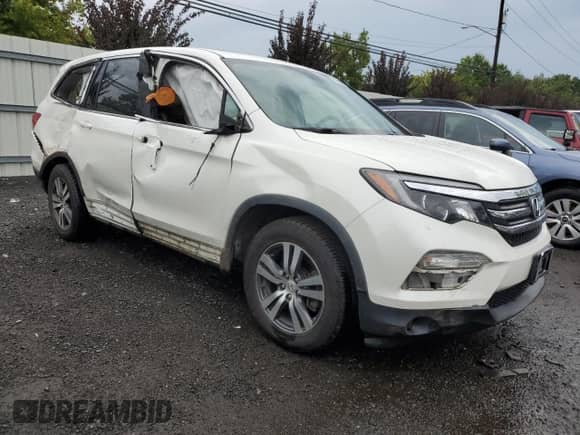 2017 Honda Pilot EX-L z VIN 5FNYF6H70HB075395, wystawiony jako Copart lot #68359434 z przebiegiem 161 215 mil mil oraz Szkoda całkowita • Salvage title. Historia ofert i sprzedaży dostępna na DreamBid. Obrazek 4.