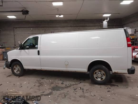 2012 Chevrolet Express Cargo with VIN 1GCWGGBA0C1100411, listed as a IAAI auction lot 41024219 with 197,251 mi miles and . Bid and sale history available at DreamBid. Image 13.