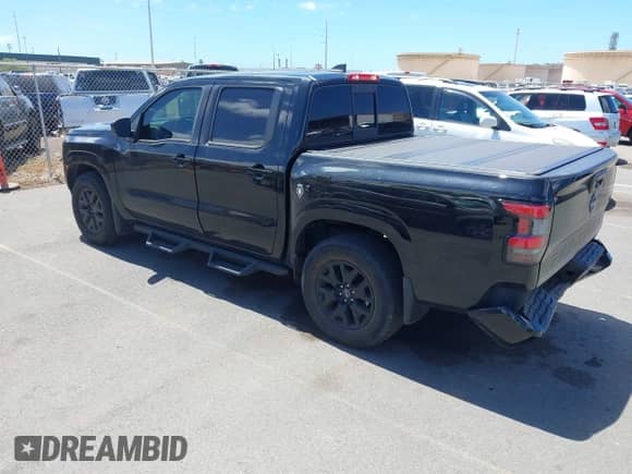 2022 Nissan Frontier S with VIN 1N6ED1EJ2NN611219, listed as a IAAI auction lot 42853516 with 51,423 mi miles and . Bid and sale history available at DreamBid. Image 3.