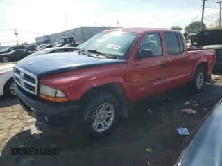 2003 Dodge Dakota Sport with VIN 1D7HL38NX3S222930, listed as a Copart auction lot 71812234 with 203,140 mi miles and Salvage title. Bid and sale history available at DreamBid. Image 1.