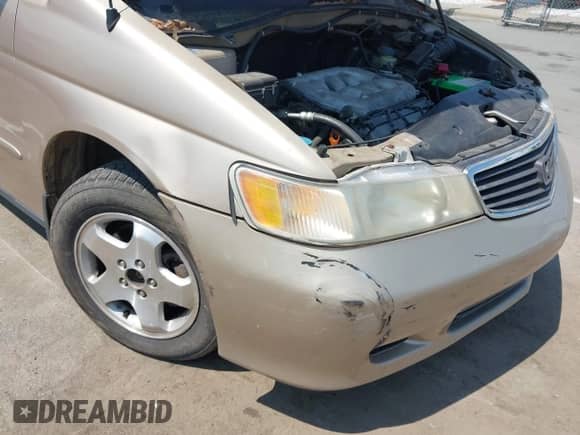 2000 Honda Odyssey EX with VIN 2HKRL1868YH001859, listed as a IAAI auction lot 42165724 with 209,393 mi miles and . Bid and sale history available at DreamBid. Image 6.