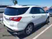 2020 Chevrolet Equinox Premier with VIN 2GNAXNEV2L6140216, listed as a IAAI auction lot 43035322 with 103,313 mi miles and . Bid and sale history available at DreamBid. Image 4.