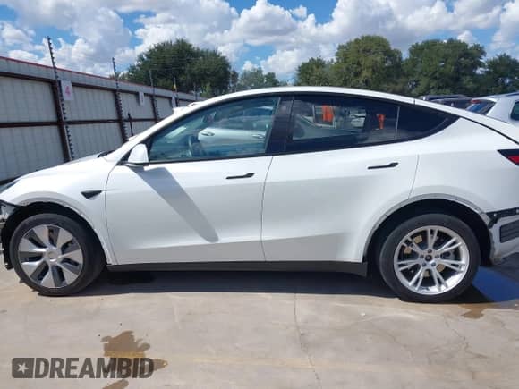 2023 Tesla Model Y Long Range with VIN 7SAYGDEE6PA078790, listed as a IAAI auction lot 43261075 with 20,370 mi miles and . Bid and sale history available at DreamBid. Image 15.