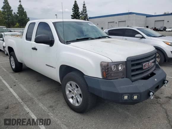2007 GMC Sierra 1500 SLE1 with VIN 1GTEC19C27Z508489, listed as a Copart auction lot 56066675 with 158,143 mi miles and Salvage title. Bid and sale history available at DreamBid. Image 4.