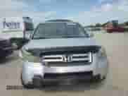 2006 Honda Pilot EX-L z VIN 5FNYF18516B013891, wystawiony jako Copart lot #68643995 z przebiegiem 204 848 mil mil oraz Szkoda całkowita • Salvage title. Historia ofert i sprzedaży dostępna na DreamBid. Obrazek 14.