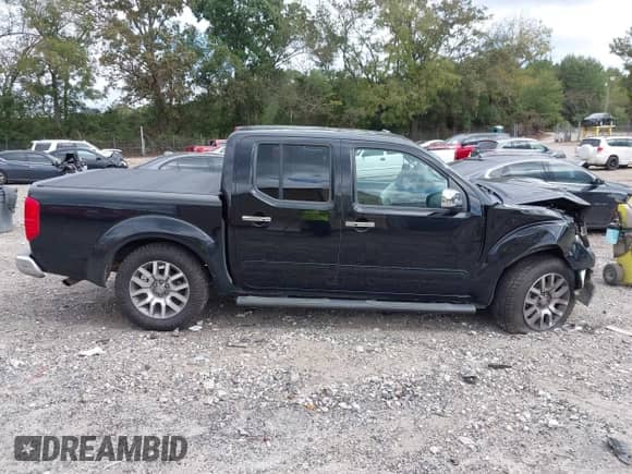 2013 Nissan Frontier SV with VIN 1N6AD0ER5DN728001, listed as a IAAI auction lot 43333484 with 140,612 mi miles and . Bid and sale history available at DreamBid. Image 13.