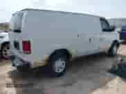 2009 Ford Econoline Cargo Commercial with VIN 1FTNE24W49DA72844, listed as a IAAI auction lot 42079600 with 221,662 mi miles and . Bid and sale history available at DreamBid. Image 4.