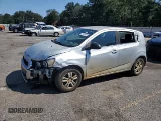 2016 Chevrolet Sonic LT with VIN 1G1JC6SHXG4143194, listed as a Copart auction lot 71050605 with 162,840 mi miles and Salvage title. Bid and sale history available at DreamBid. Image 1.