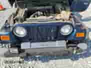 2000 Jeep Wrangler Sport with VIN 1J4FA49S5YP744967, listed as a Copart auction lot 67909665 with 141,990 mi miles and Clean title. Bid and sale history available at DreamBid. Image 12.