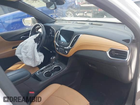 2021 Chevrolet Equinox Premier with VIN 3GNAXNEV2MS147136, listed as a IAAI auction lot 42929222 with 61,778 mi miles and . Bid and sale history available at DreamBid. Image 5.